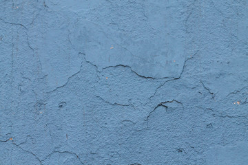 vintage blue wall with worn out time paint