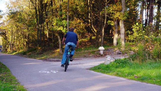 male mountain biker in a forest park.