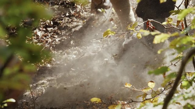 The feets of Vikings running along the slope