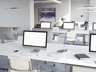 Coworking loft interior with computers. 3d rendering