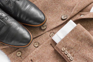 Tweed jacket with its details of buttons