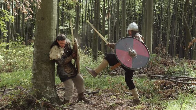 Medieval Warriors of Vikings are fighting during attack .