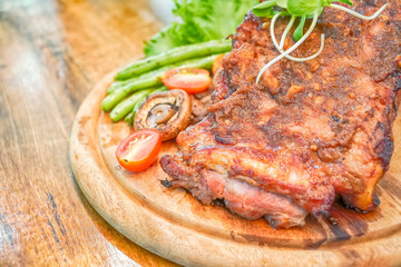 Tasty grilled ribs with vegetables