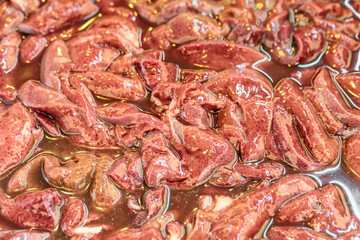 Close-up pieces of raw pork liver