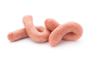 Raw sausages with herbs and spices.