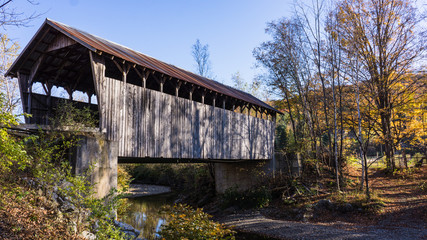 covered bridge over creek
