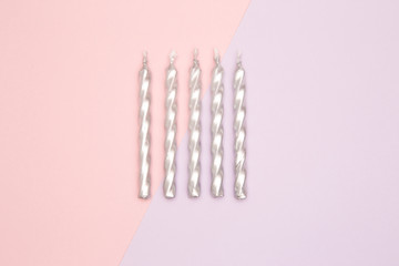 Birthday Candles on a Pink and Purple Background