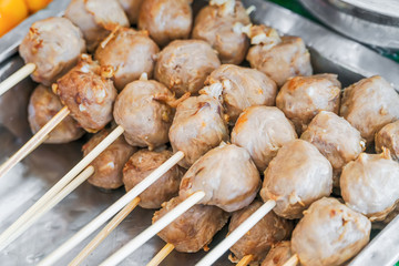 Thai steamed meat snacks being offered in a street food market