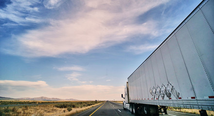 freight truck on open highway in desert