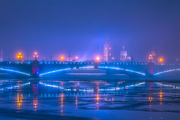 Fototapeta na wymiar Fog over the Peter and Paul Fortress. Russia. Evening Petersburg. The Neva River in St. Petersburg.