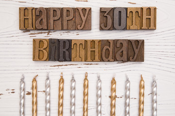Happy 30th Birthday Spelled in Type Set