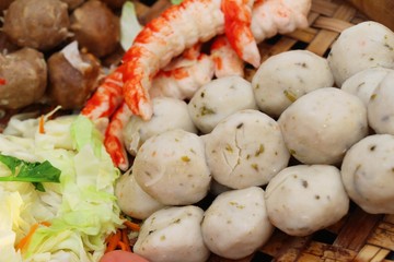 Meatballs and sausages steamed in the market