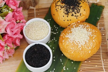 Bread bun with sesame and poppy seeds