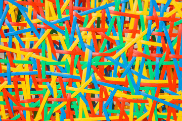 Close up abstract image or texture of colorful plastic weave.