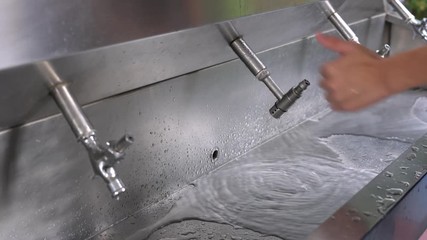 4K Footage, Asian boy turn off school water tap for save water campaign with thumbs up sign. Turn off for save water when do not use.