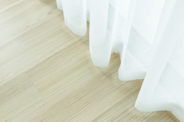 White curtain inside the window. Interior decoration