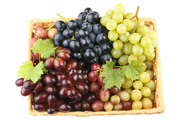 Grapes in basket isolated on white background