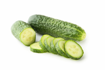 Sliced cucumbers isolated on white background