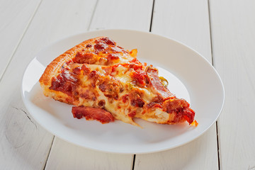 Top view of Italian rustic one slice pizza