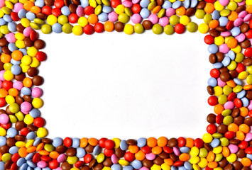 Obraz premium Pile of colorful sweet bonbons.A frame of sweets.