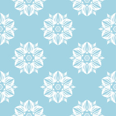 White floral seamless pattern on blue background