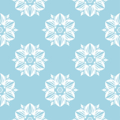 White floral seamless pattern on blue background