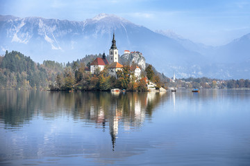 Autumn view of  the historical church on the island in Lake Bled