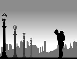 Grandfather carrying a grandchild piggyback on the street, one in the series of similar images silhouette