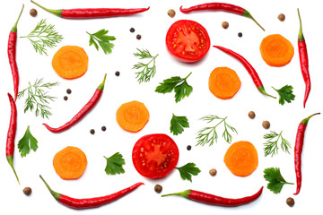 mix red hot chili peppers with parsley and sliced carrot and garlic isolated on white background top view