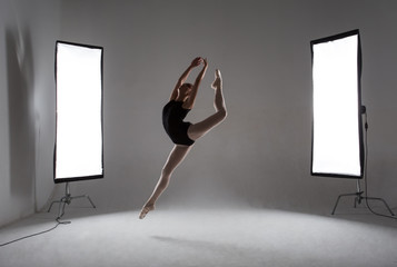 Backstage shooting a graceful ballerina in the studio