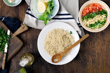 Ingredients for cooking vegetarian salad with porridge bulgur and vegetables