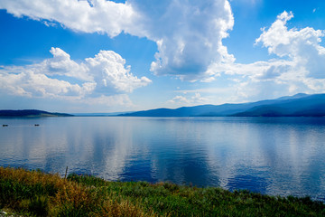 The beautiful calm waters of Jackson Lake near Grand Teton National Park in Wyoming.