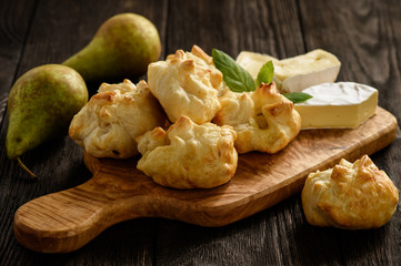 Puff pastry pies with camembert cheese and pears.