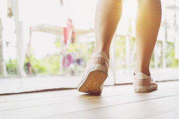 Walking women and sneaker shoes
