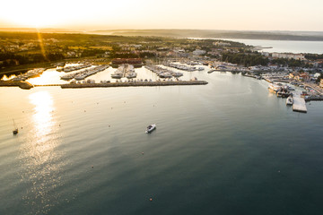 Fototapeta premium aerial drone view of sunrise over novigrad in summer