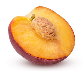 Ripe peach fruit cut in half with bone