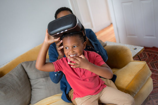 Boy with VR headset - Powered by Adobe