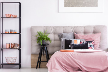 Bedroom with black metal rack