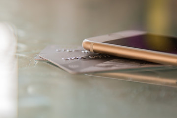 credit cards and mobile phone on the table