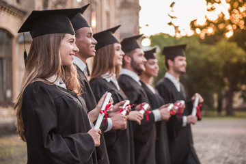 Happy young alumni