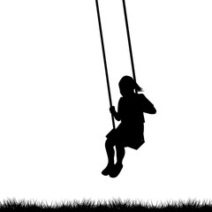 Child having fun on a swing outdoor