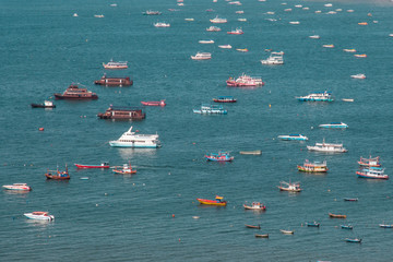 Many boats and ferry in the sea
