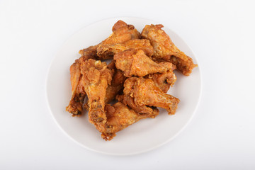 Buffalo Wings on White Plate and Counter
