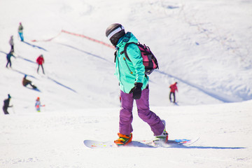 Fototapeta na wymiar snowboarder skating in ski resort