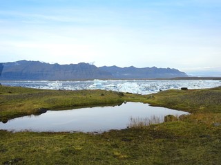 Obraz premium Entre montagne et océan, volcans et Fjord, faune et Flore d'Islande