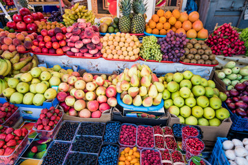 Fruit market with various colorful fresh fruits. Fresh fruits.  Fruits  at a farmers market