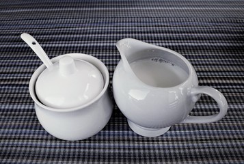 sugar and milk on the table 