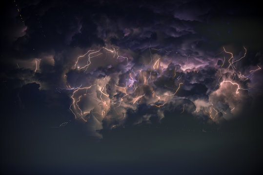 Lightning in storm cloud, Star on the sky