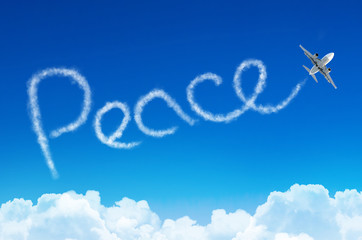 Naklejka premium Peace - inscription in the sky left by airplane.