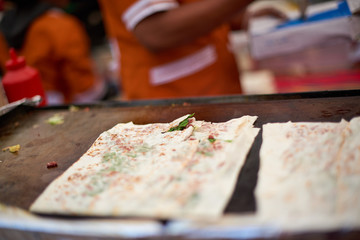 Fresh foccaccia bread on hot plate in Camden